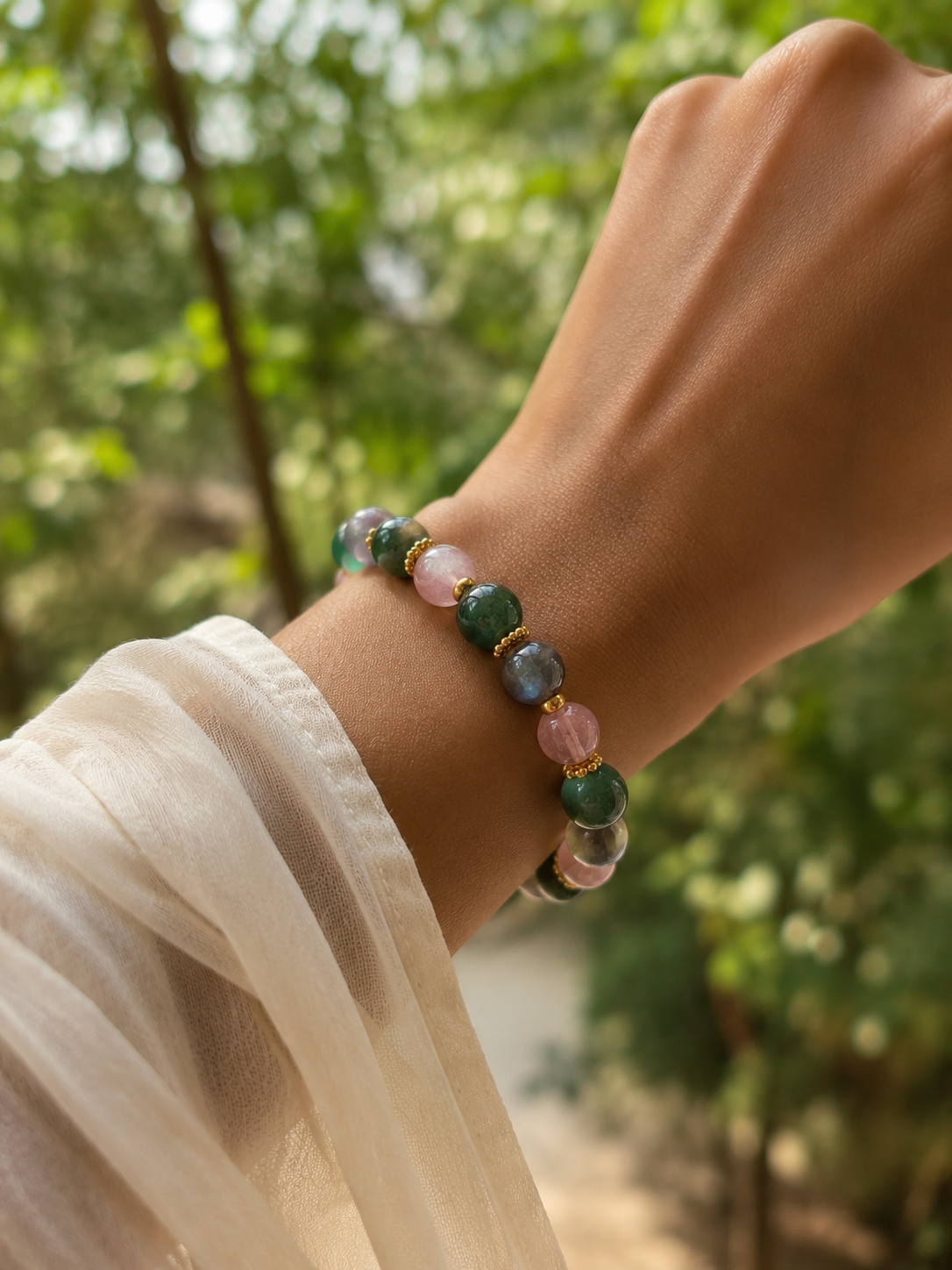 Priya wearing her Pancha Healing bracelet